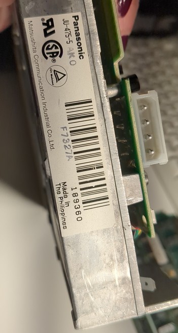 a label in the back of the drive stating manufacturer and part number