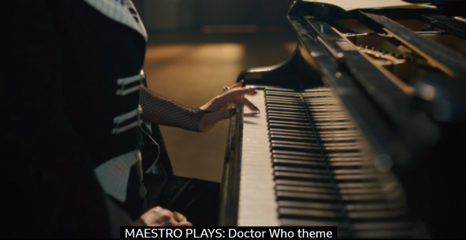 a close up of maestro playing a piano, the subtitle reads 