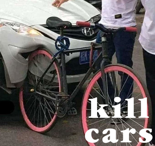 Car bumped into a bicycle which has in turn destroyed the car's front apron.