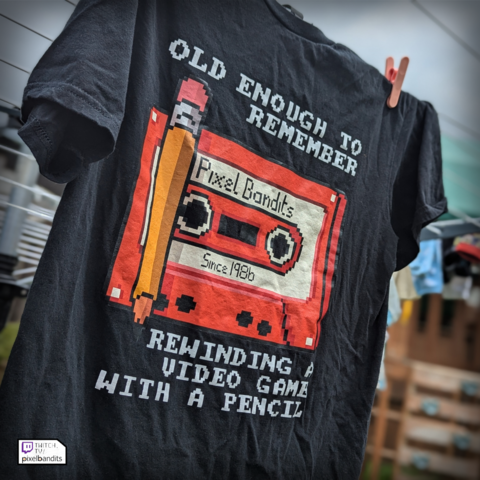 Tshirts with a pixel art tshirts of a pencil and a tape cassette saying 