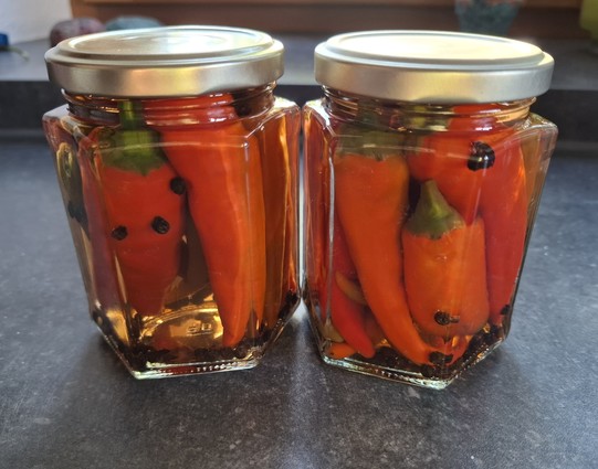 2 small glasses with chilli in sweet-sour vinegar